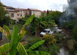 Bourg de Buzet - rive du ruisseau, à l'arrière des maisons de l'avenue de la République